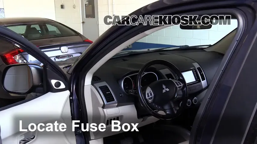 Interior Fuse Box Location: 2008 Mitsubishi Outlander SE 2.4L 4 Cyl