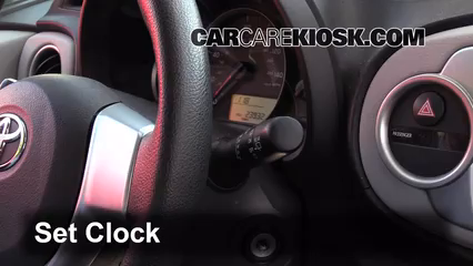 2012 Toyota Yaris L 1.5L 4 Cyl. Hatchback (4 Door) Clock
