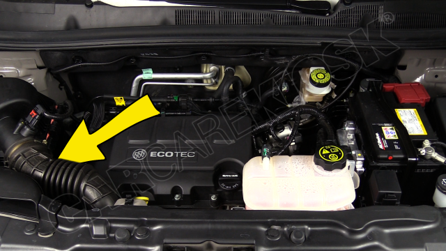 The air conditioning fill cap is in the front left of the engine bay, under the air intake vent