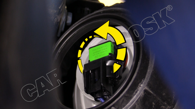 Remove the headlight assembly by turning it counter clockwise